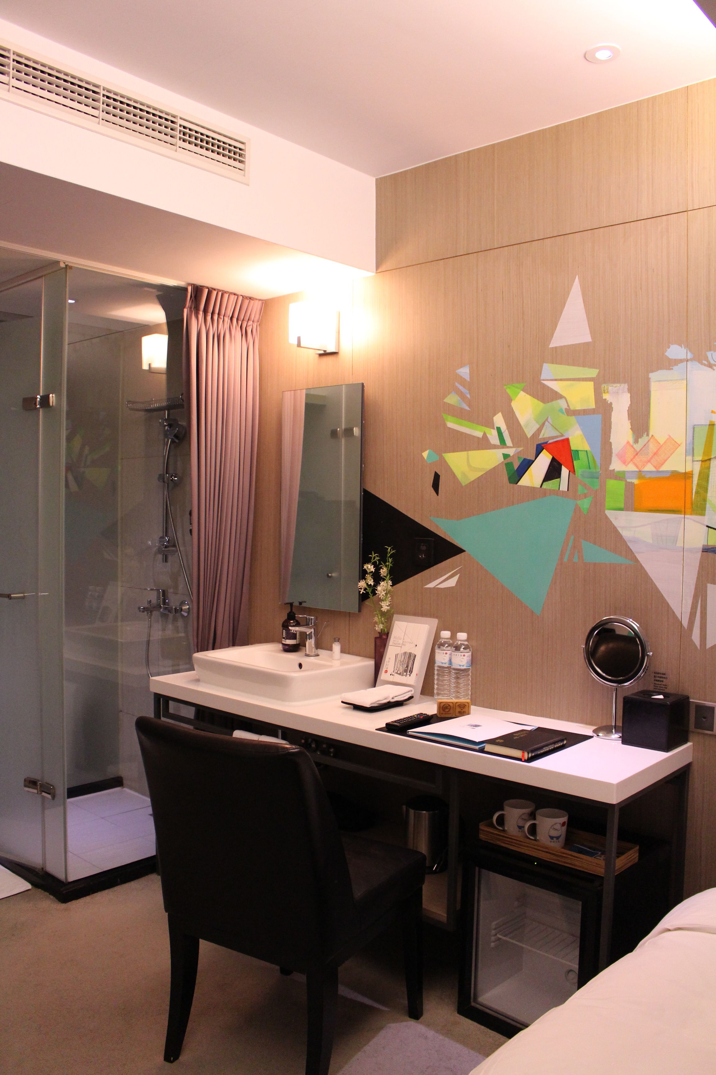 shower, hair dryer, slippers, towels