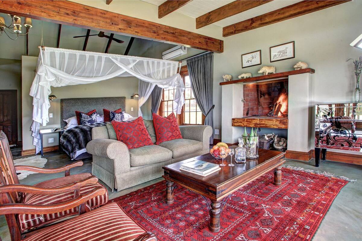 Executive Cabin, River View | Living area | Fireplace