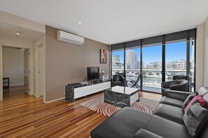 Three Bedroom Apartment | Living area | 32-inch LCD TV with cable channels, TV, DVD player - Docklands Private Collection of Apartments - NewQuay (Docklands)