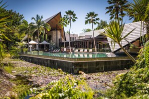 Outdoor pool, pool umbrellas, sun loungers