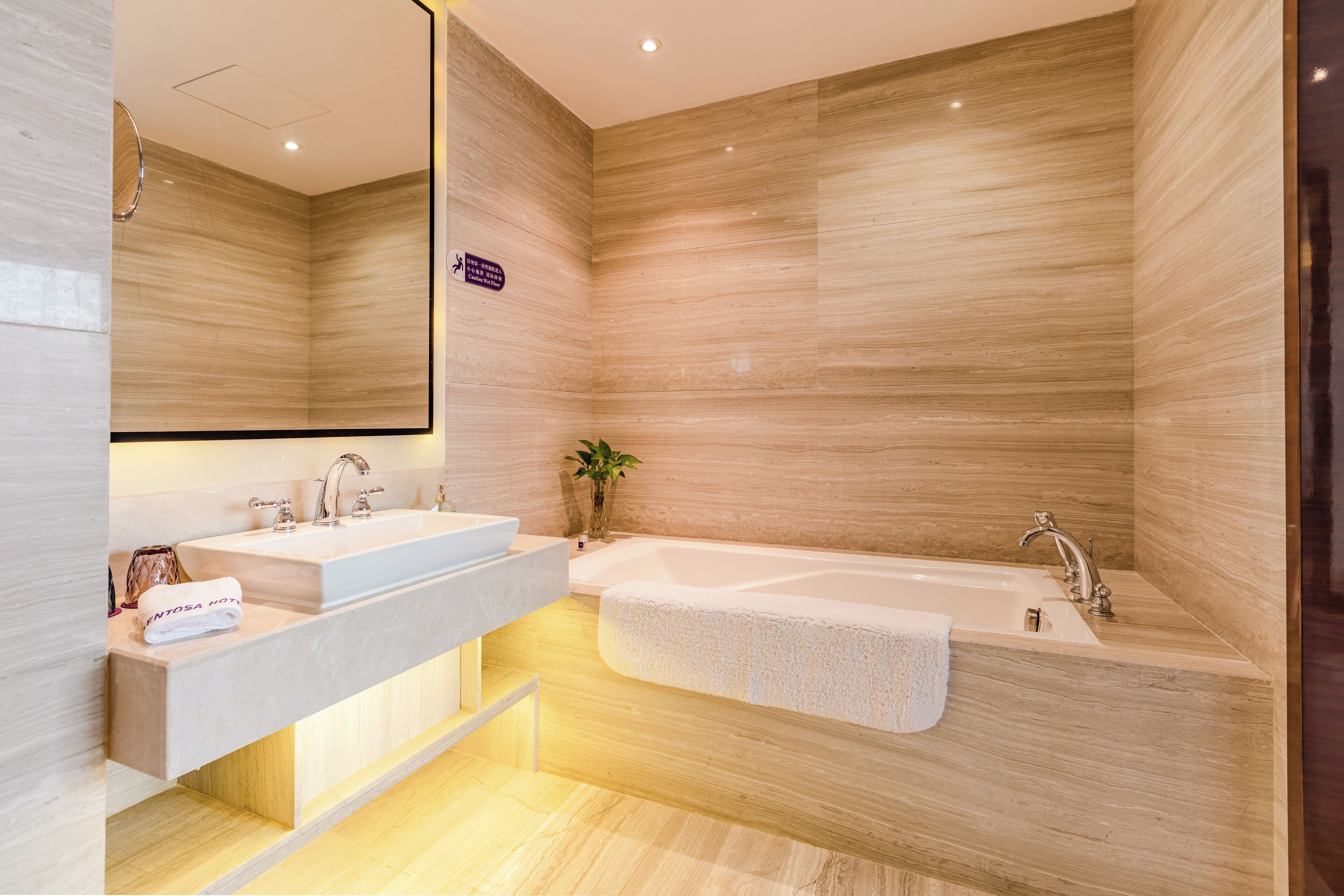 business suite, 1 king bed | bathroom | designer toiletries, hair dryer, bathrobes, slippers