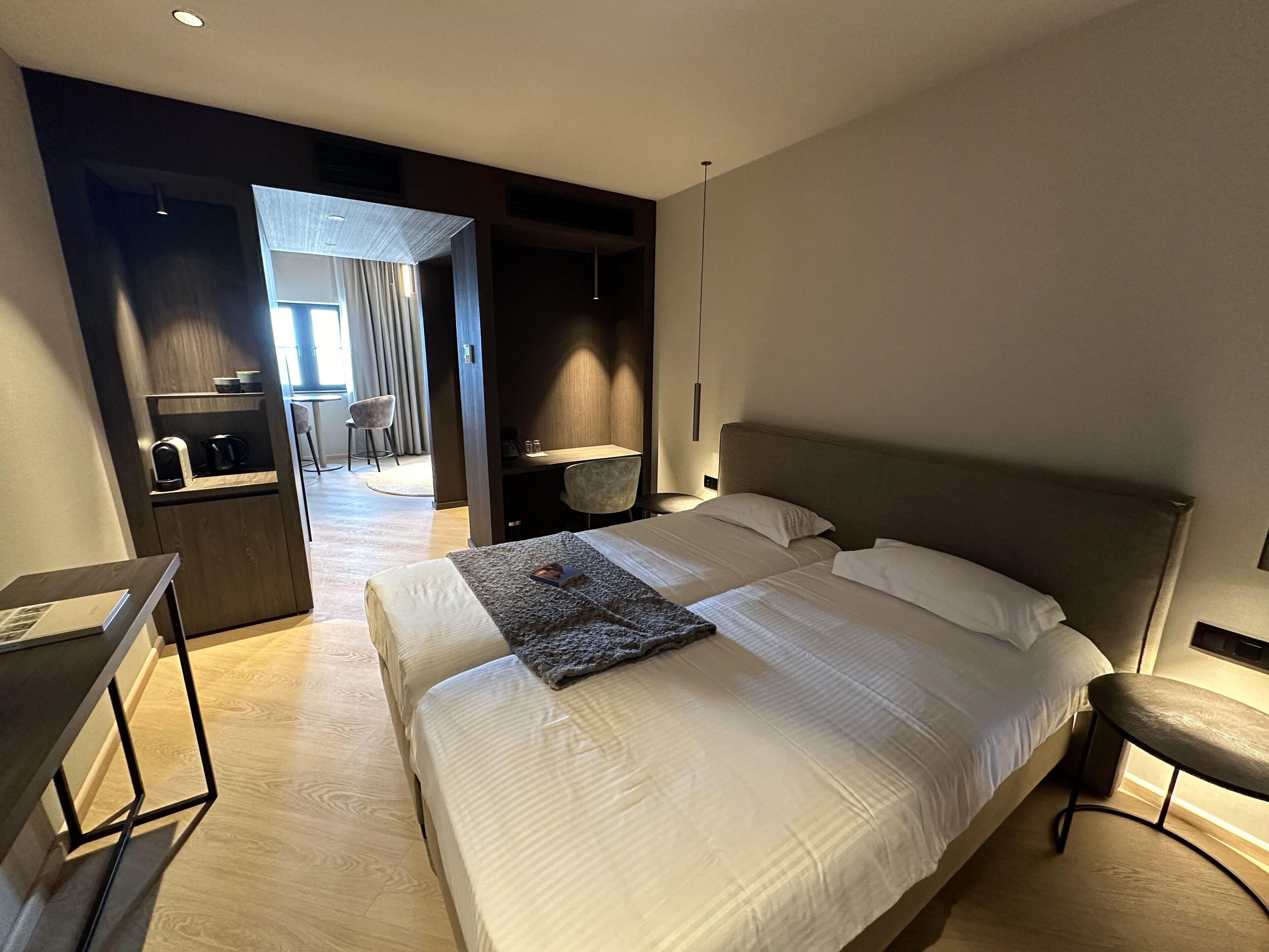 twin room, sea view | minibar, in-room safe, desk, blackout curtains