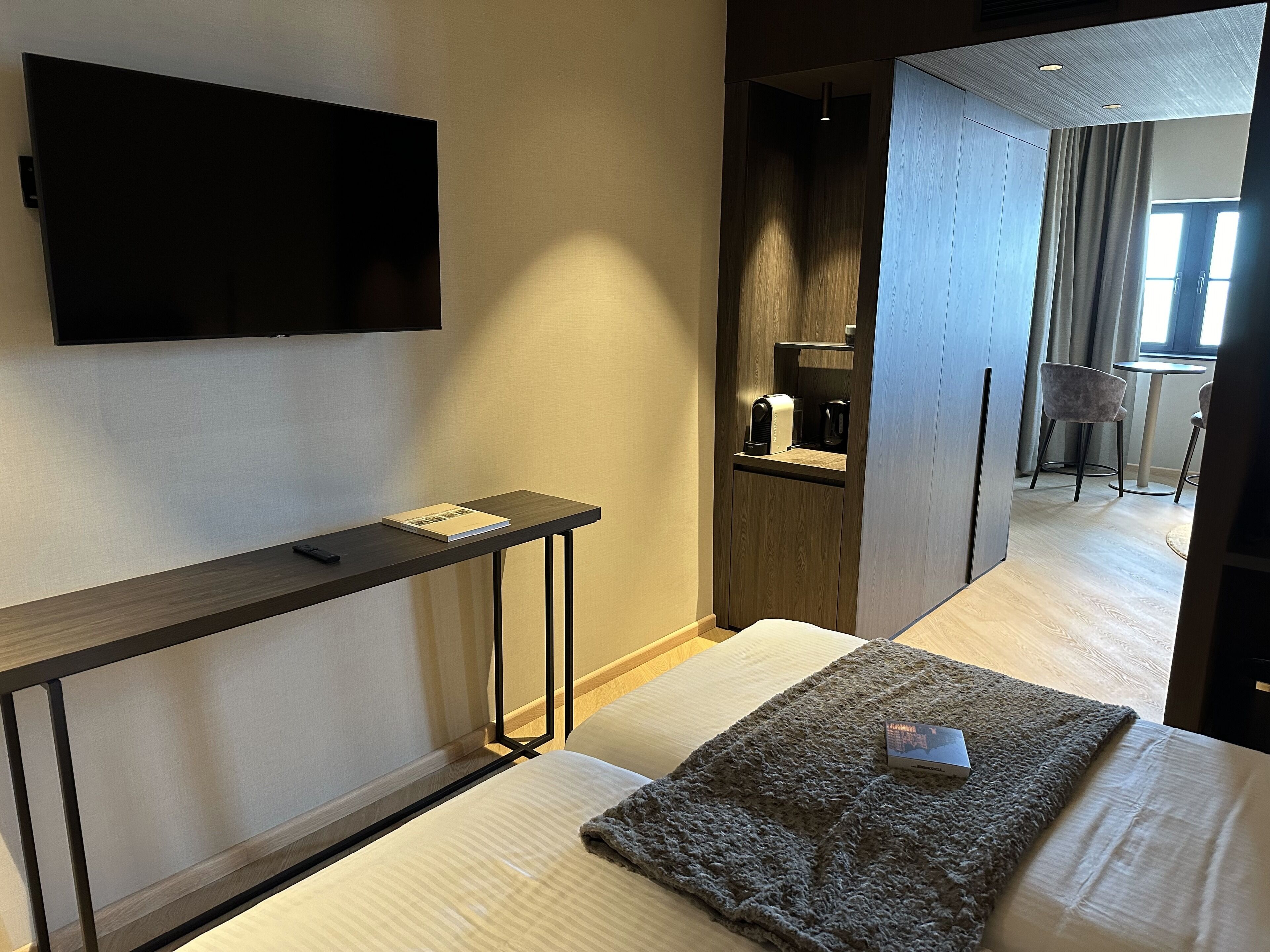 twin room, sea view | minibar, in-room safe, desk, blackout curtains