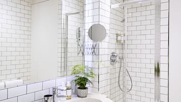 Eco-friendly toiletries, hair dryer, bathrobes, towels