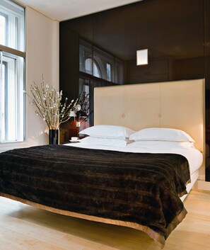 Luxe beddengoed, een kluis op de kamer, individueel gedecoreerd