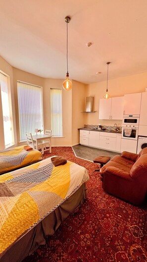 Familiestudio | Individuelt dekorert, strykejern/-brett, wi-fi (inkludert) og sengetøy