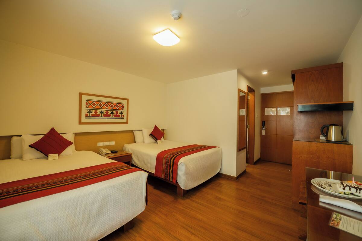 Family Room | Premium bedding, in-room safe, desk, WiFi (free)