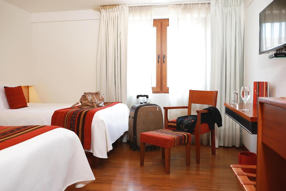 Premium bedding, in-room safe, desk, WiFi (free)