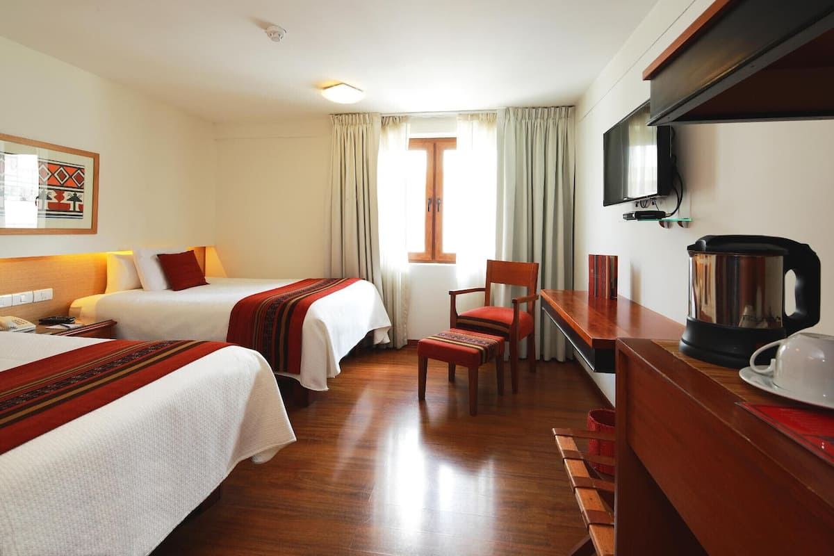Premium bedding, in-room safe, desk, WiFi (free)
