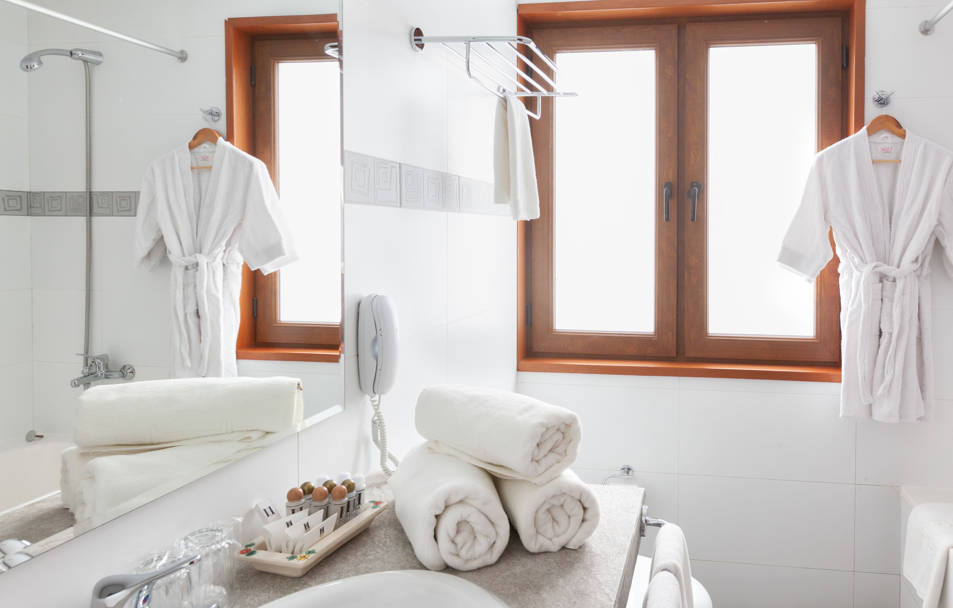family room | bathroom | designer toiletries, hair dryer, towels, soap
