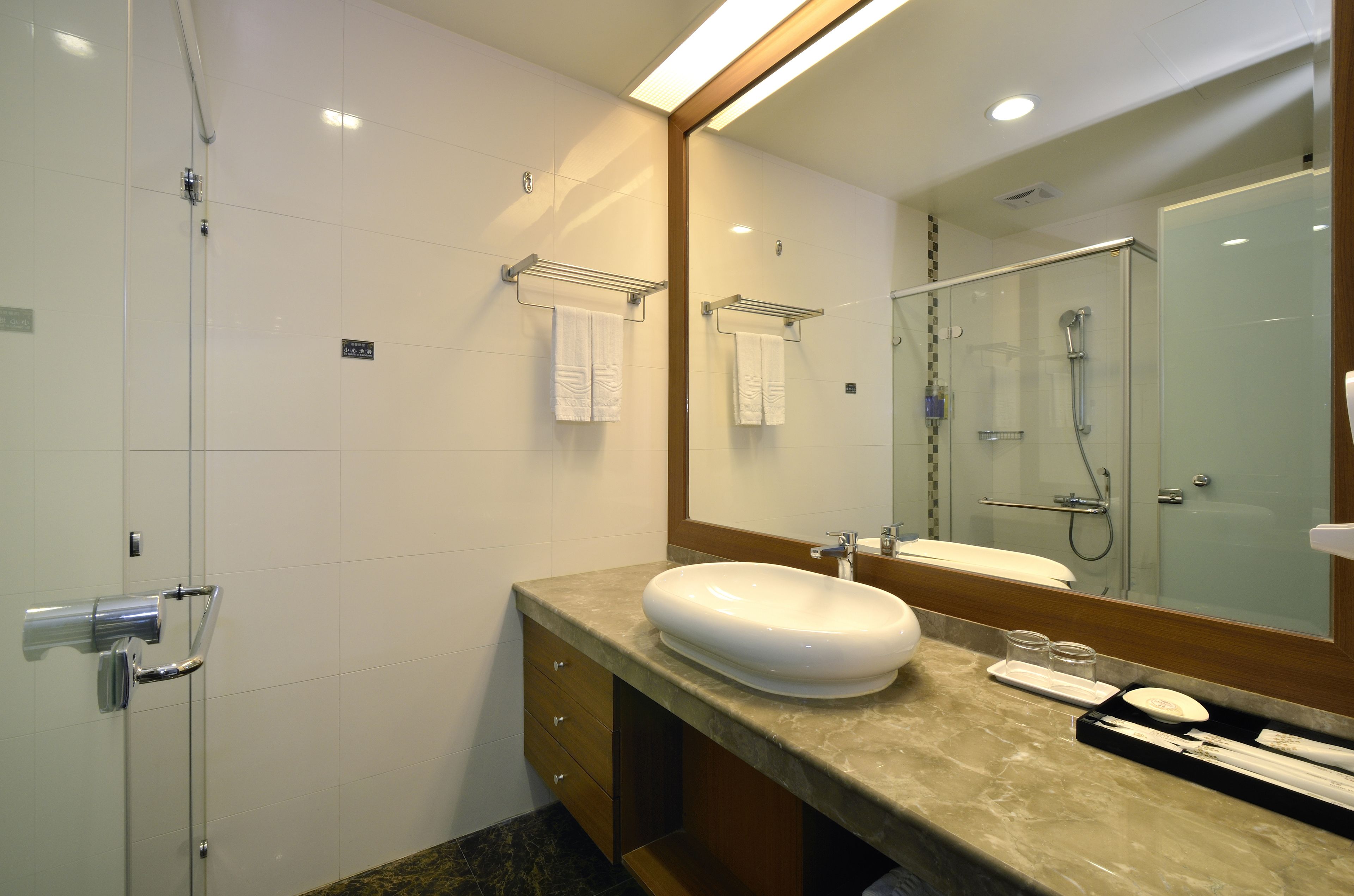 superior twin room, 2 single beds | bathroom | shower, free toiletries, hair dryer, slippers