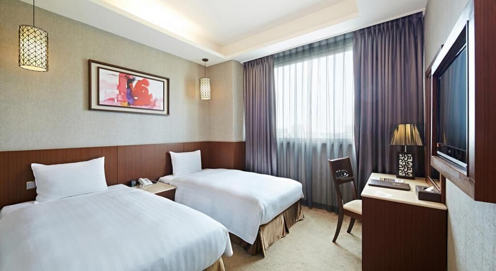 Premium bedding, down comforters, free minibar, in-room safe