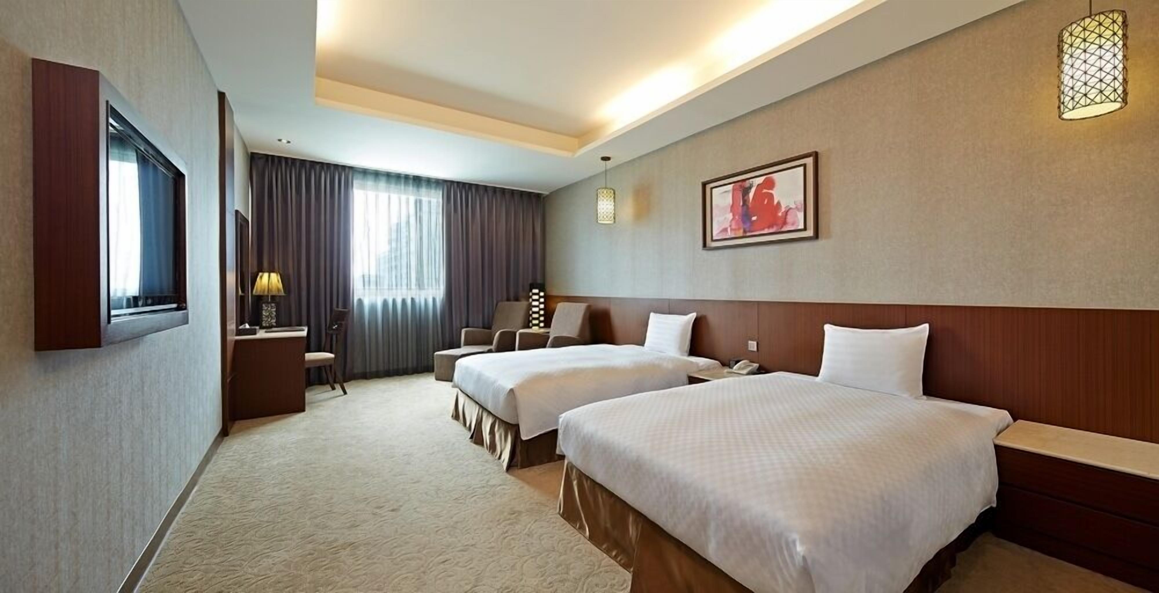 Premium bedding, down comforters, free minibar, in-room safe