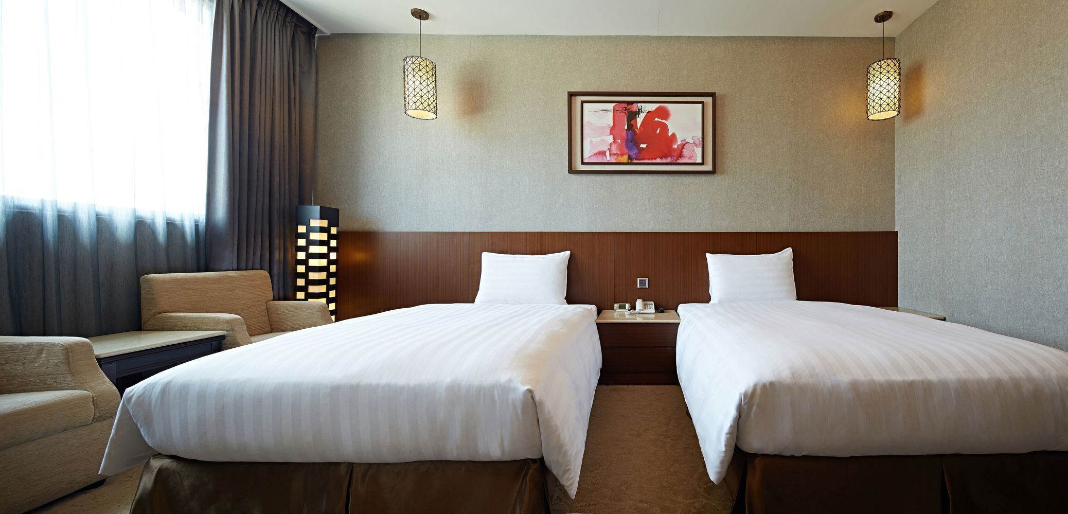 Premium bedding, down comforters, free minibar, in-room safe