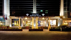 The exterior of Teatro Boutique Hotel with a grand entrance, columns, and a well-lit facade. - Teatro Boutique Hotel (Baku)
