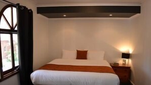 Quarto executivo, para não fumantes, cozinha (Executive Apartment) | 1 quarto, frigobar, cofres nos quartos, escrivaninha