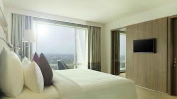 Suite Executive, 1 letto king | Minibar, una cassaforte in camera, una scrivania, ferro/asse da stiro