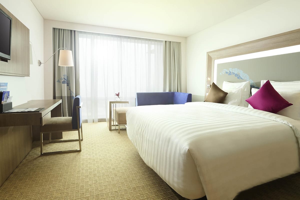 Quarto executivo, 1 cama King | Frigobar, cofres nos quartos, escrivaninha
