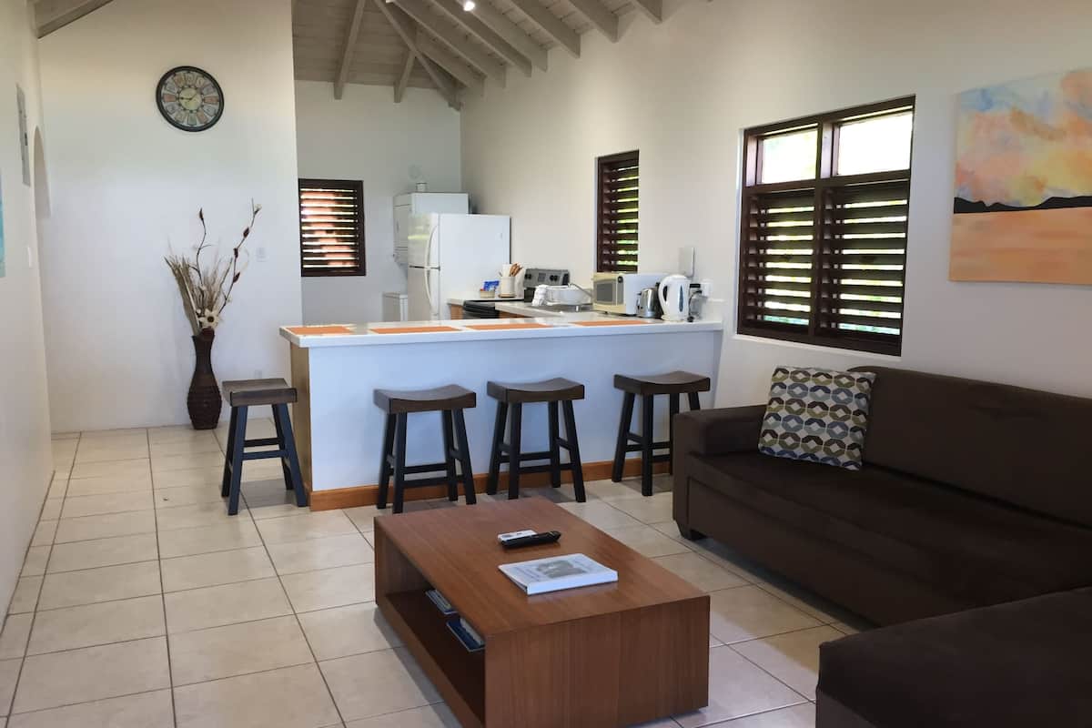superior cottage, 2 bedrooms, beachfront | private kitchen | full-sized fridge, microwave, stovetop, coffee/tea maker
