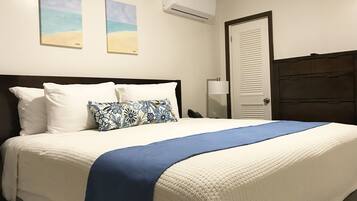 Suite, 1 King Bed with Sofa bed, Garden View | In-room safe, iron/ironing board, WiFi (free), bed sheets