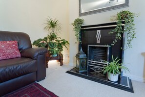 Standard Apartment, 1 Bedroom | Living area | 32-inch flat-screen TV with digital channels, LCD TV, DVD player