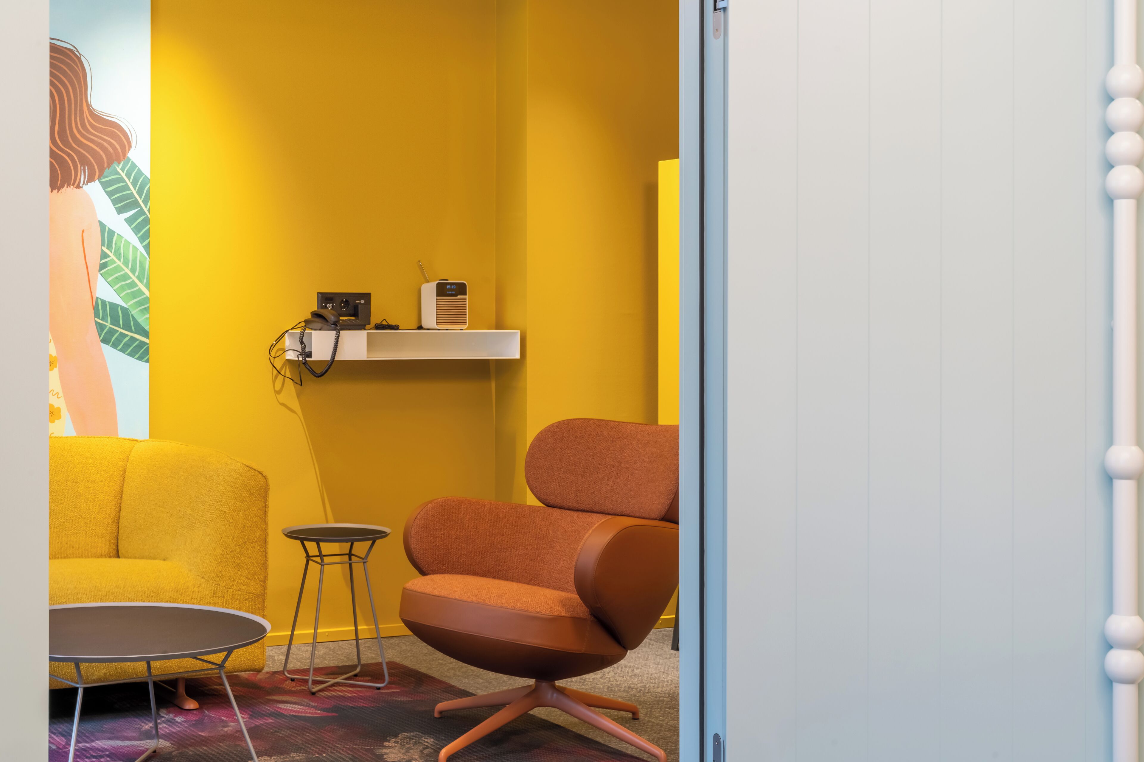 boutique suite with balcony | living area | 22-inch flat-screen tv with satellite channels, tv, heated floors