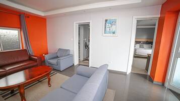 Comfort Apartment, 2 Bedrooms | Living area | 32-inch flat-screen TV with satellite channels, TV