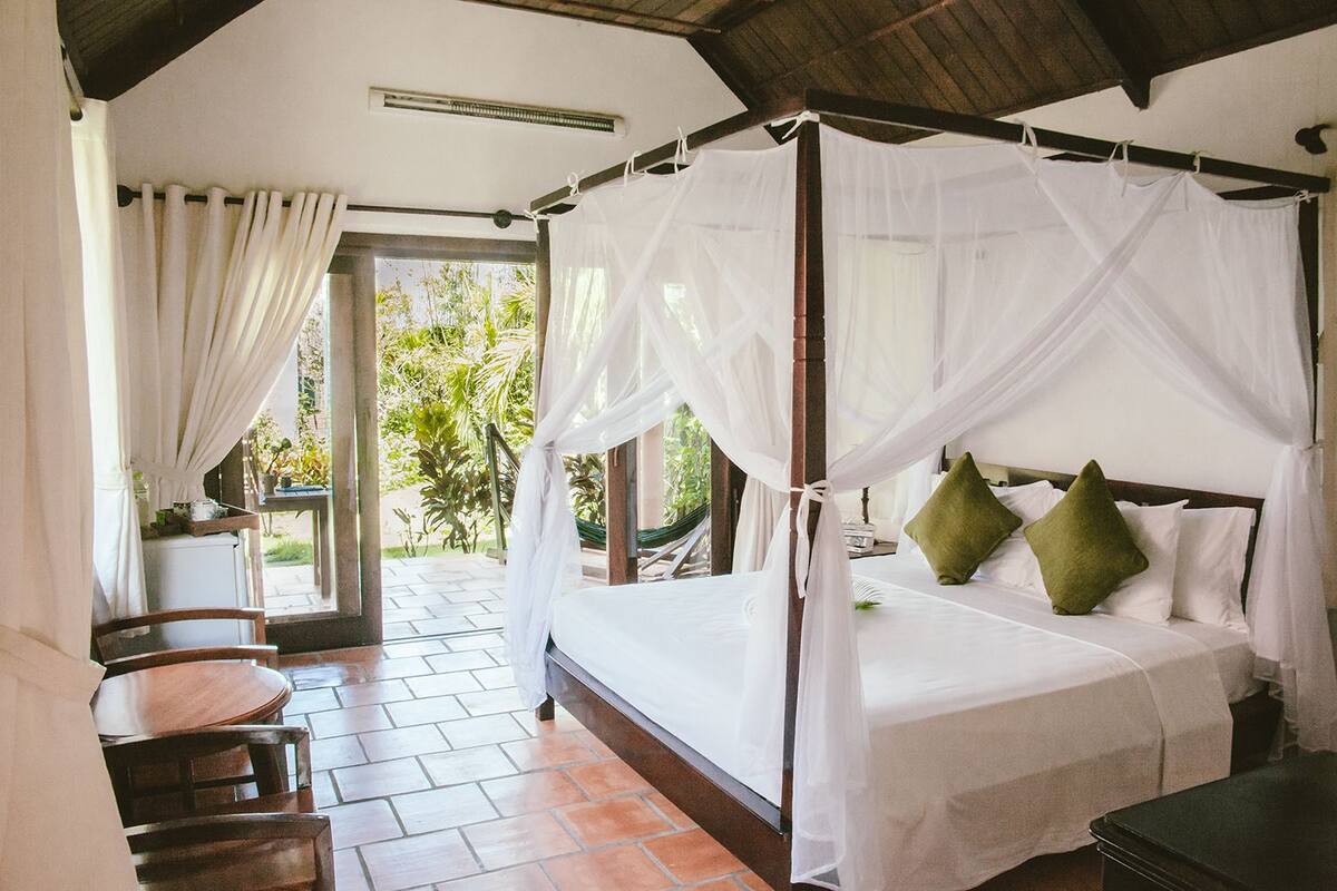 Superior Bungalow, Garden View | Minibar, in-room safe, free WiFi, bed sheets