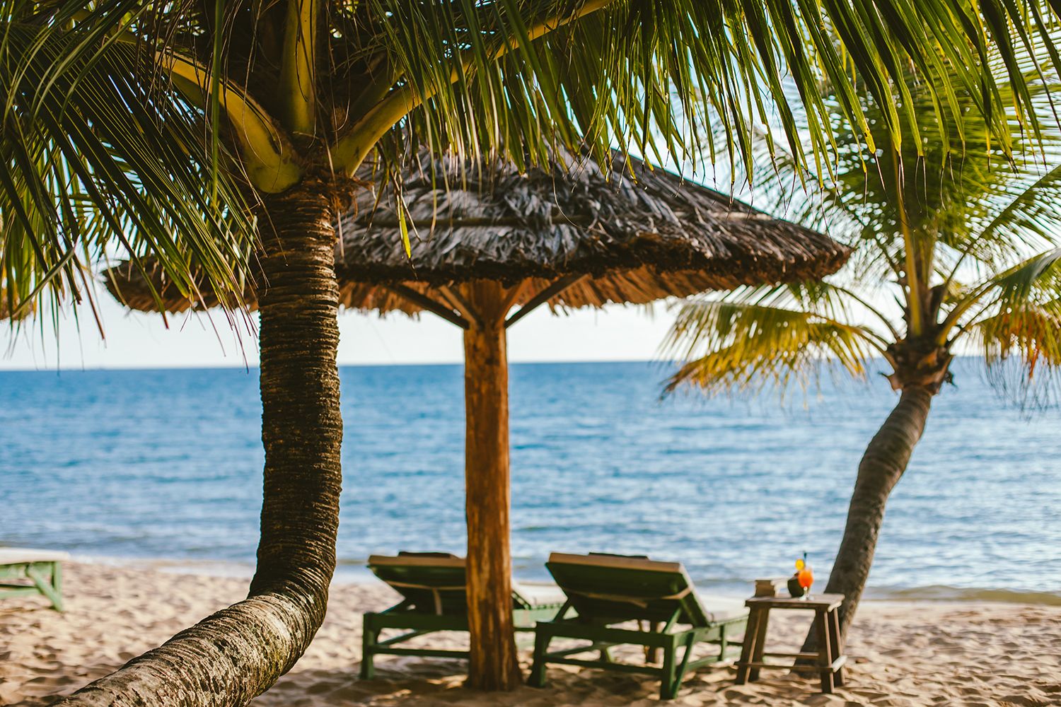 on the beach, sun-loungers, beach umbrellas, beach bar