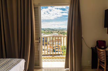 Premium Room | Minibar, in-room safe, individually decorated, individually furnished