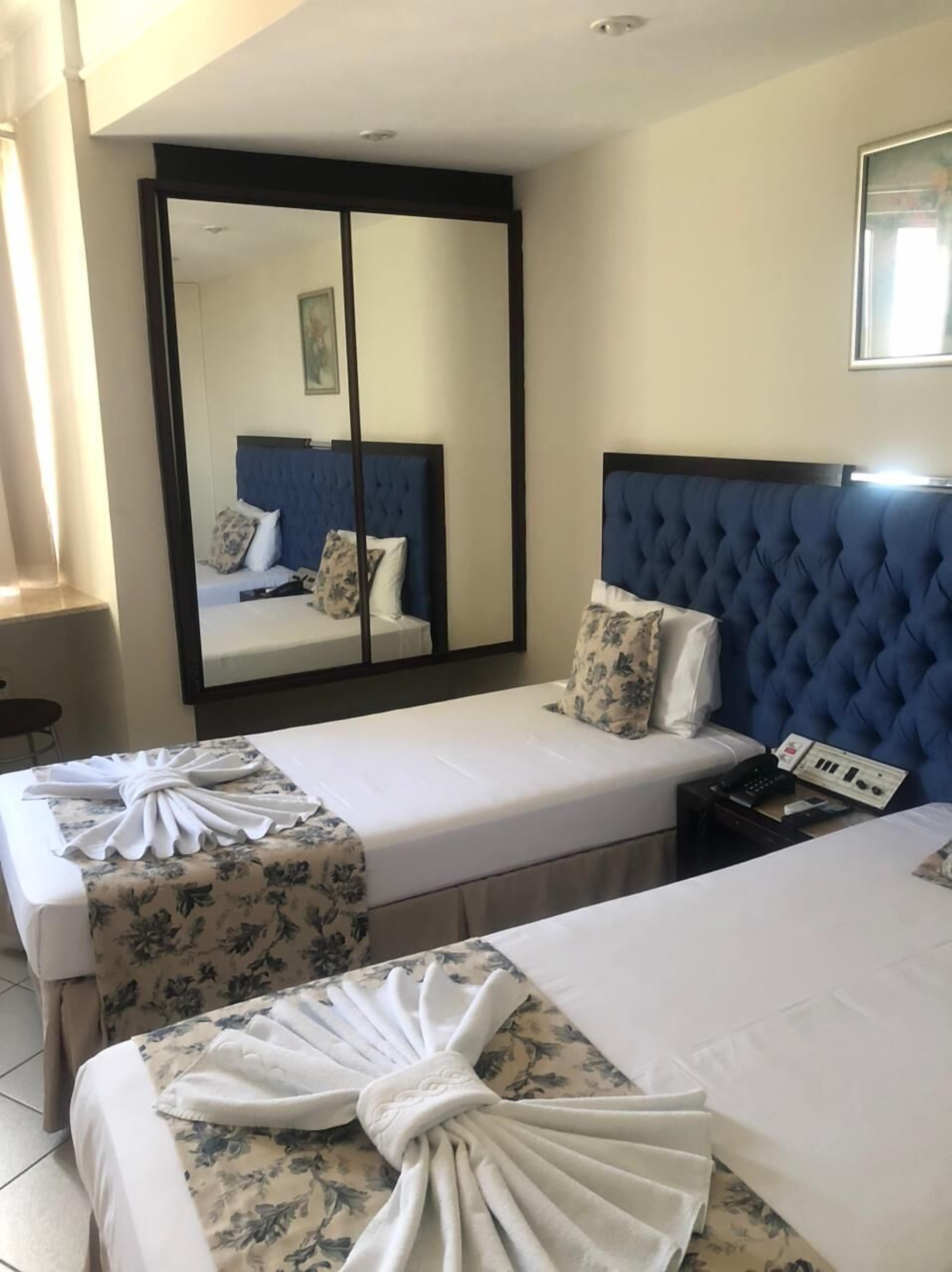 standard single room | 1 bedroom, minibar, in-room safe, blackout curtains