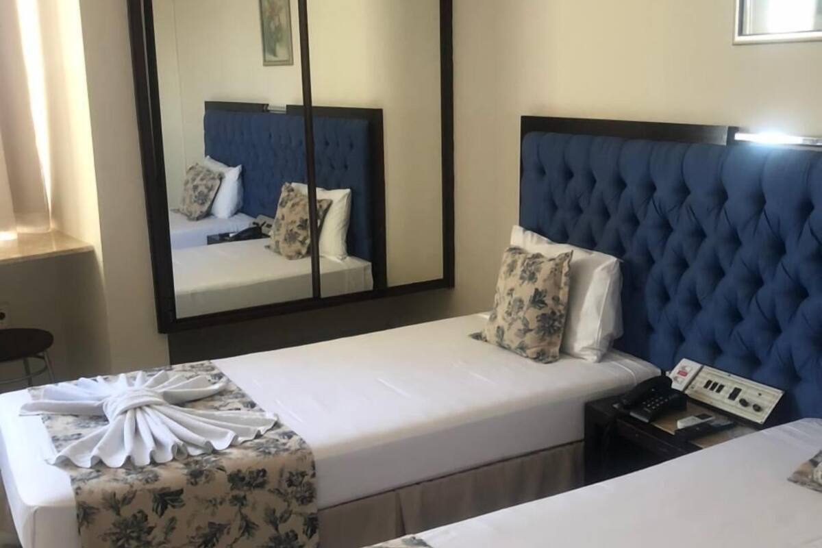 standard single room | 1 bedroom, minibar, in-room safe, blackout curtains