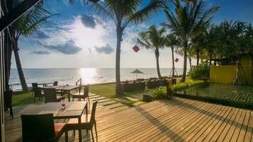 On the beach, sun-loungers, beach umbrellas, beach towels