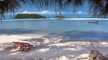 On the beach, beach towels, windsurfing, kayaking
