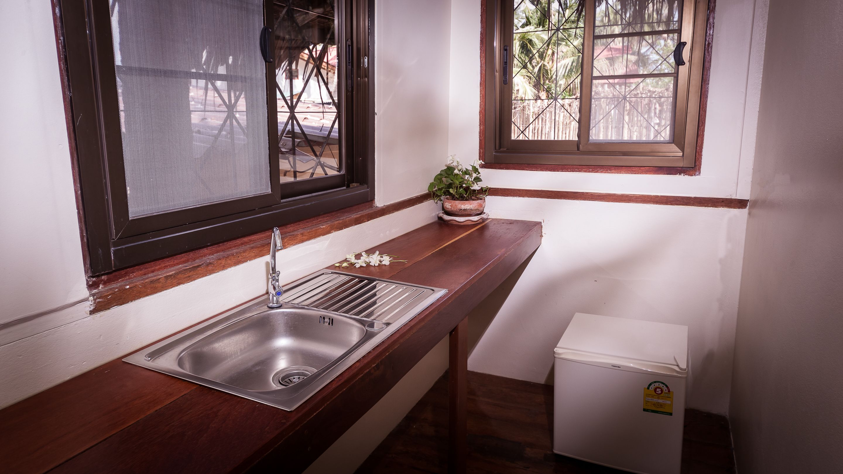 bungalow garden view third row | 1 bedroom, in-room safe, desk, free cots/infant beds