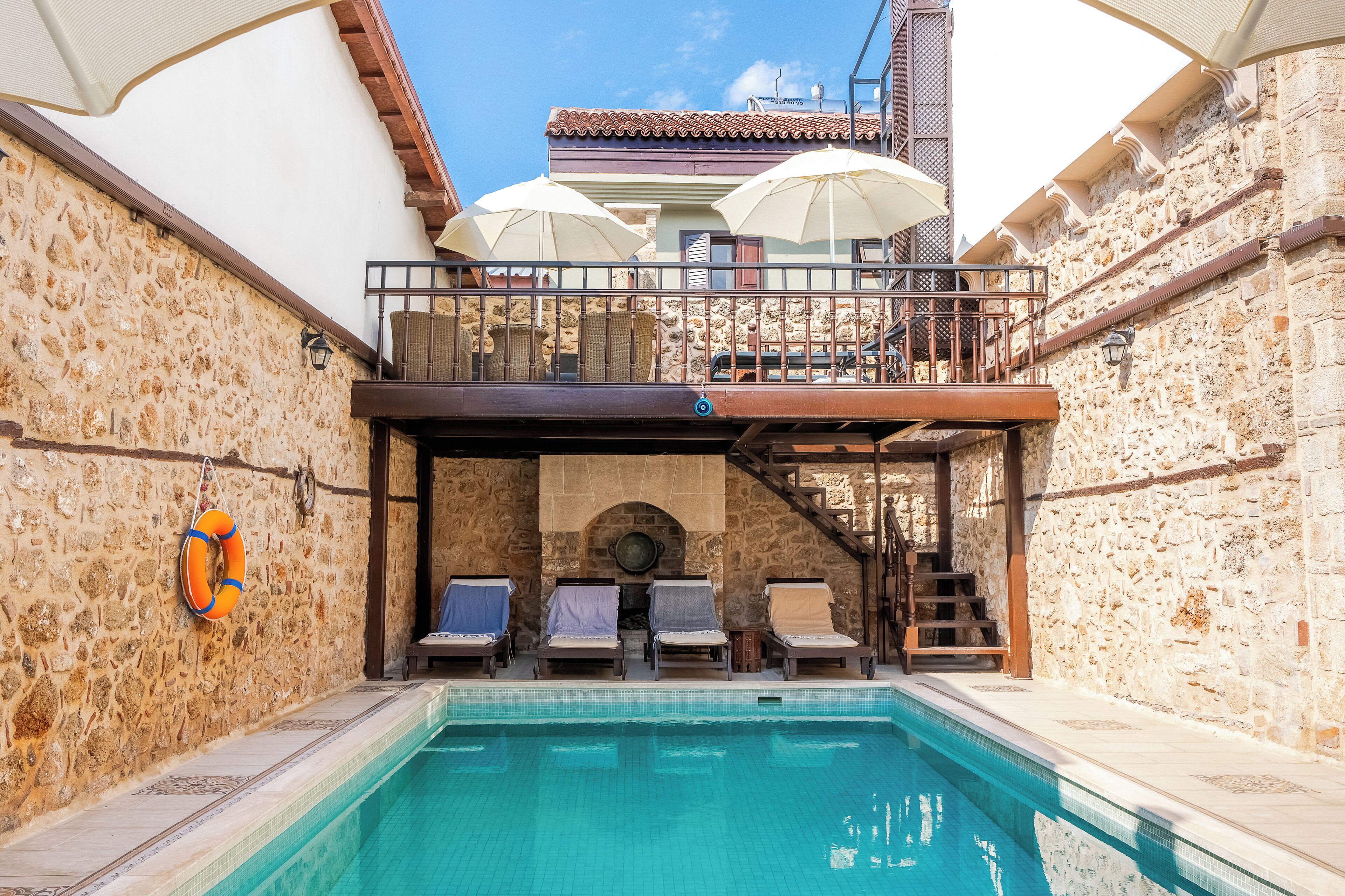 outdoor pool, pool umbrellas, pool loungers