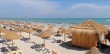 Private beach nearby, white sand, sun loungers, beach umbrellas