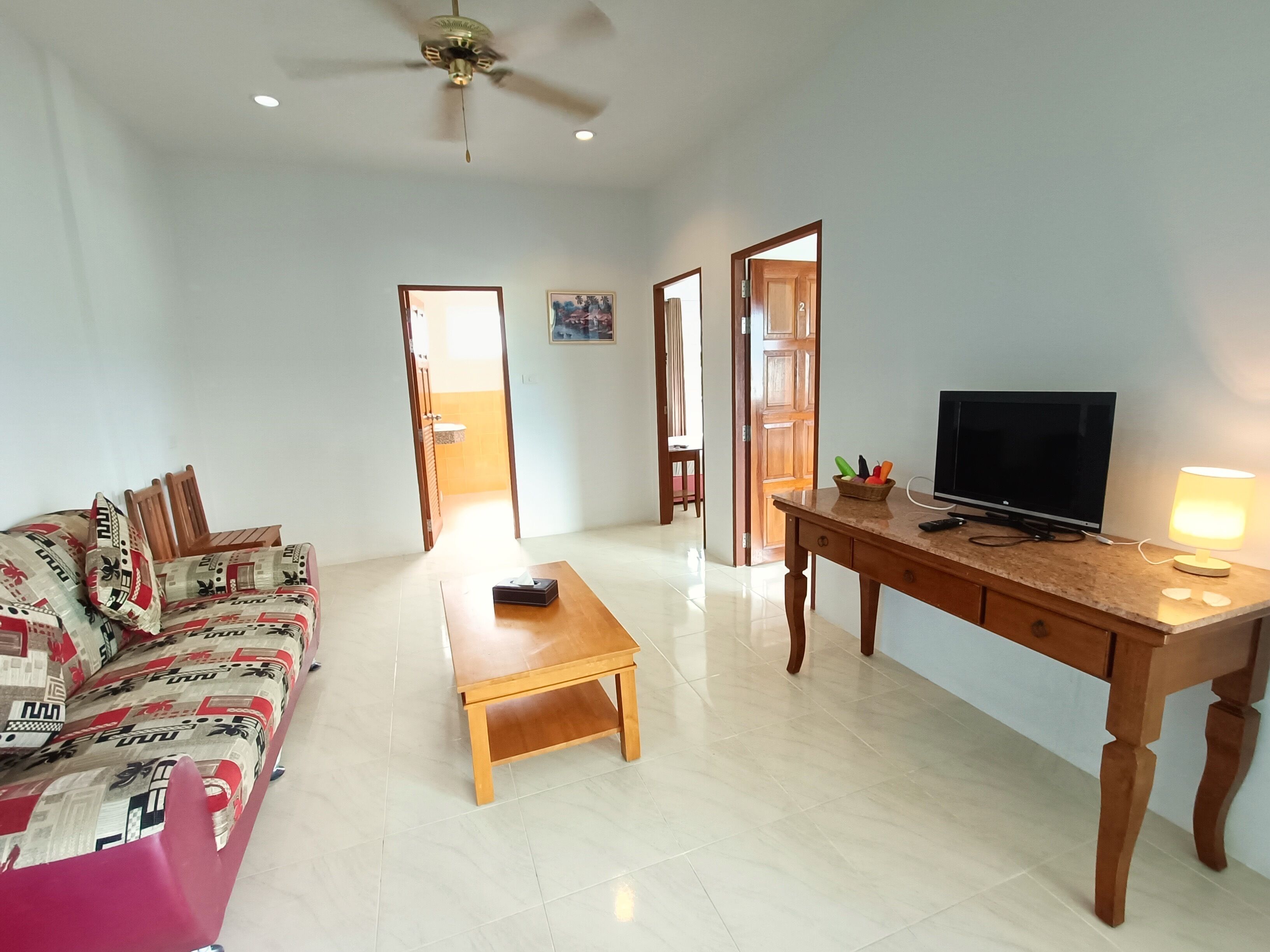 junior apartment, 2 bedrooms, ocean view | living area | 34-cm flat-screen tv with satellite channels, tv