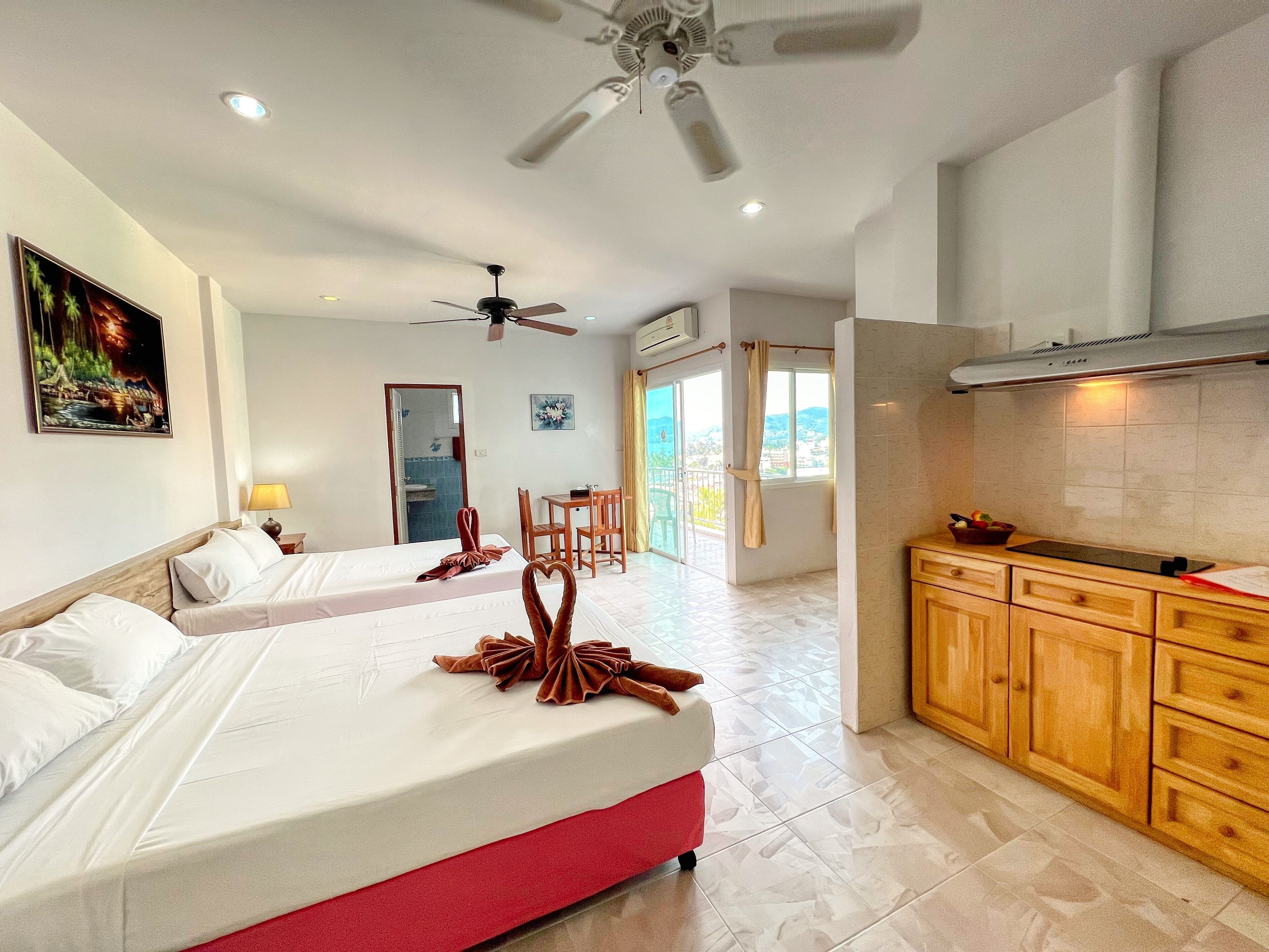 deluxe studio, 2 double beds, ocean view | blackout curtains, soundproofing, free wifi, bed sheets