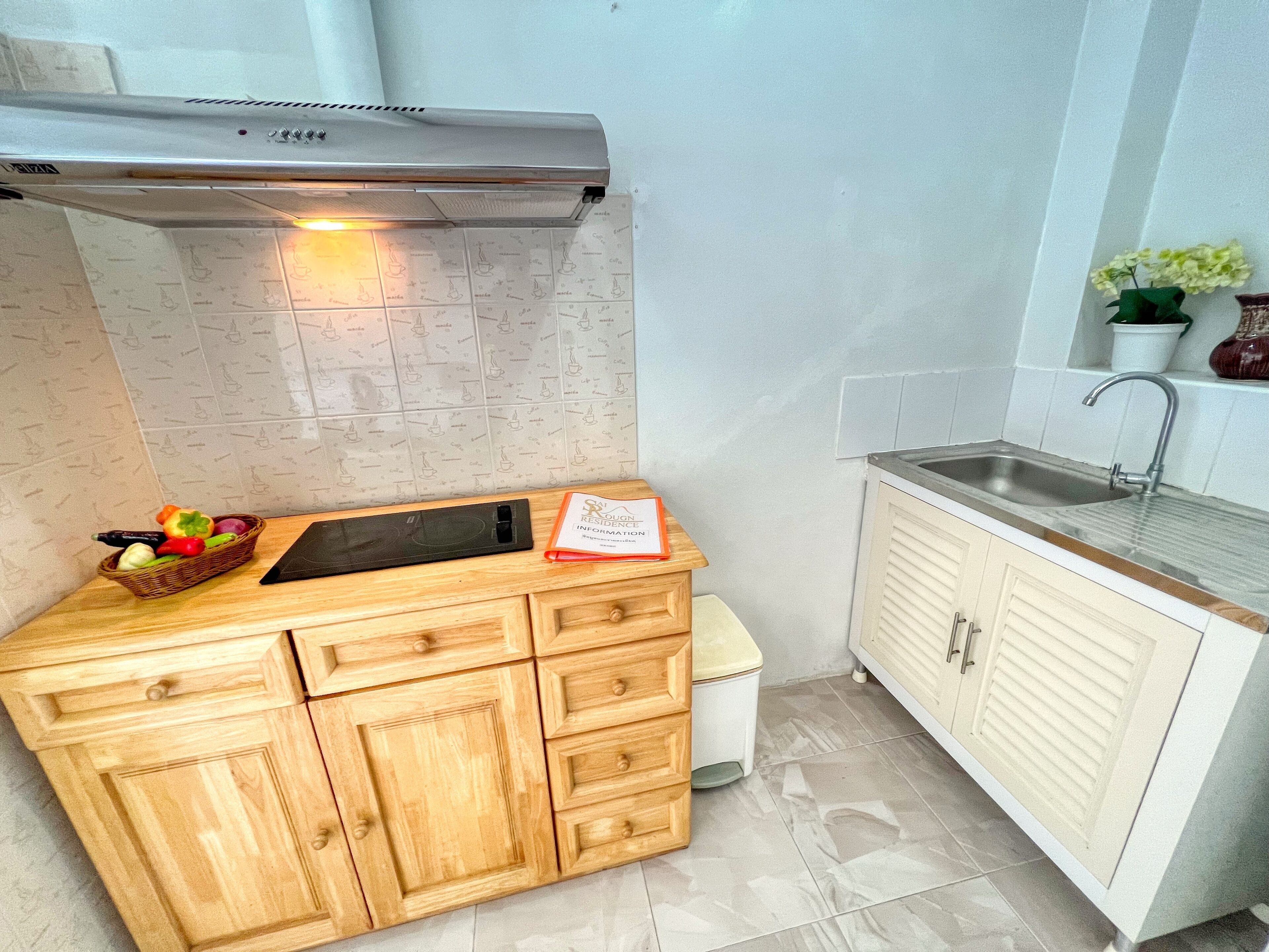 deluxe studio, 2 double beds, ocean view | private kitchen | fridge, electric kettle, freezer, dining tables