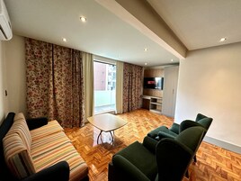 Svit Presidential - 1 kingsize-säng - icke-rökare - bubbelbad | Vardagsrum