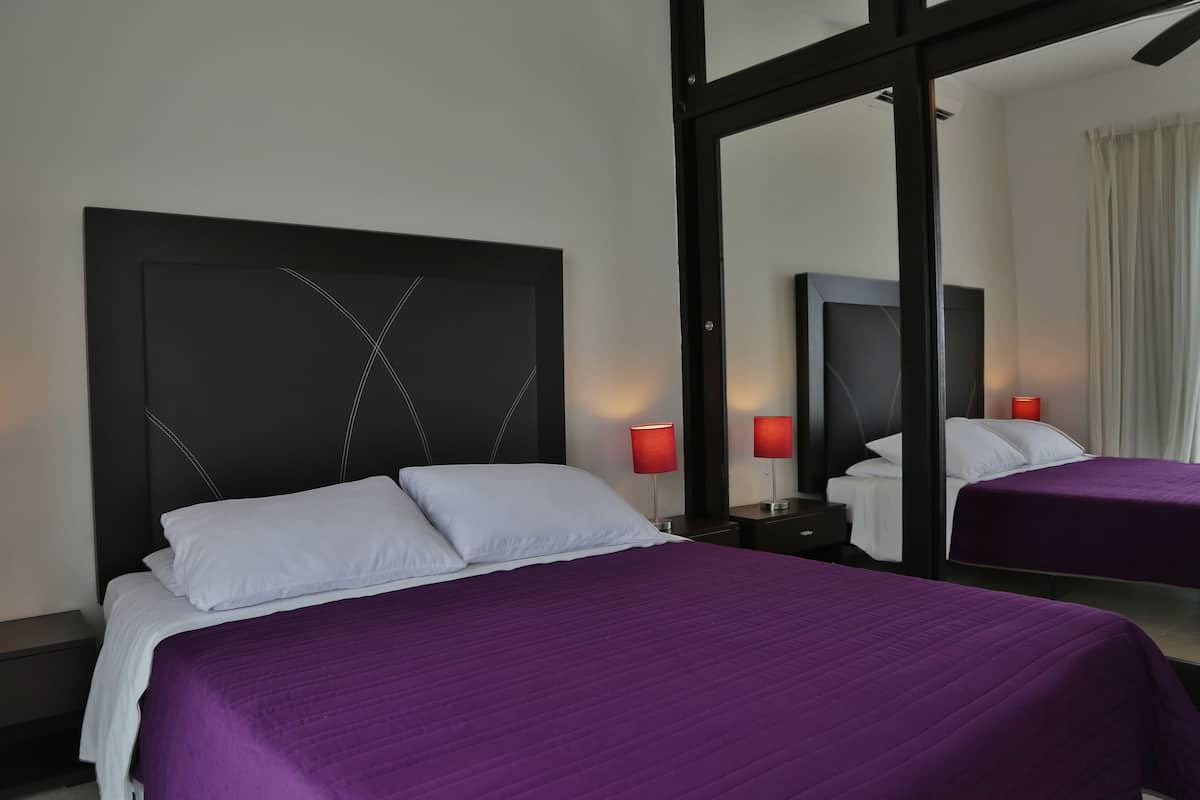 Junior Apartment, 1 Queen Bed, Ground Floor | 1 bedroom, in-room safe, blackout drapes