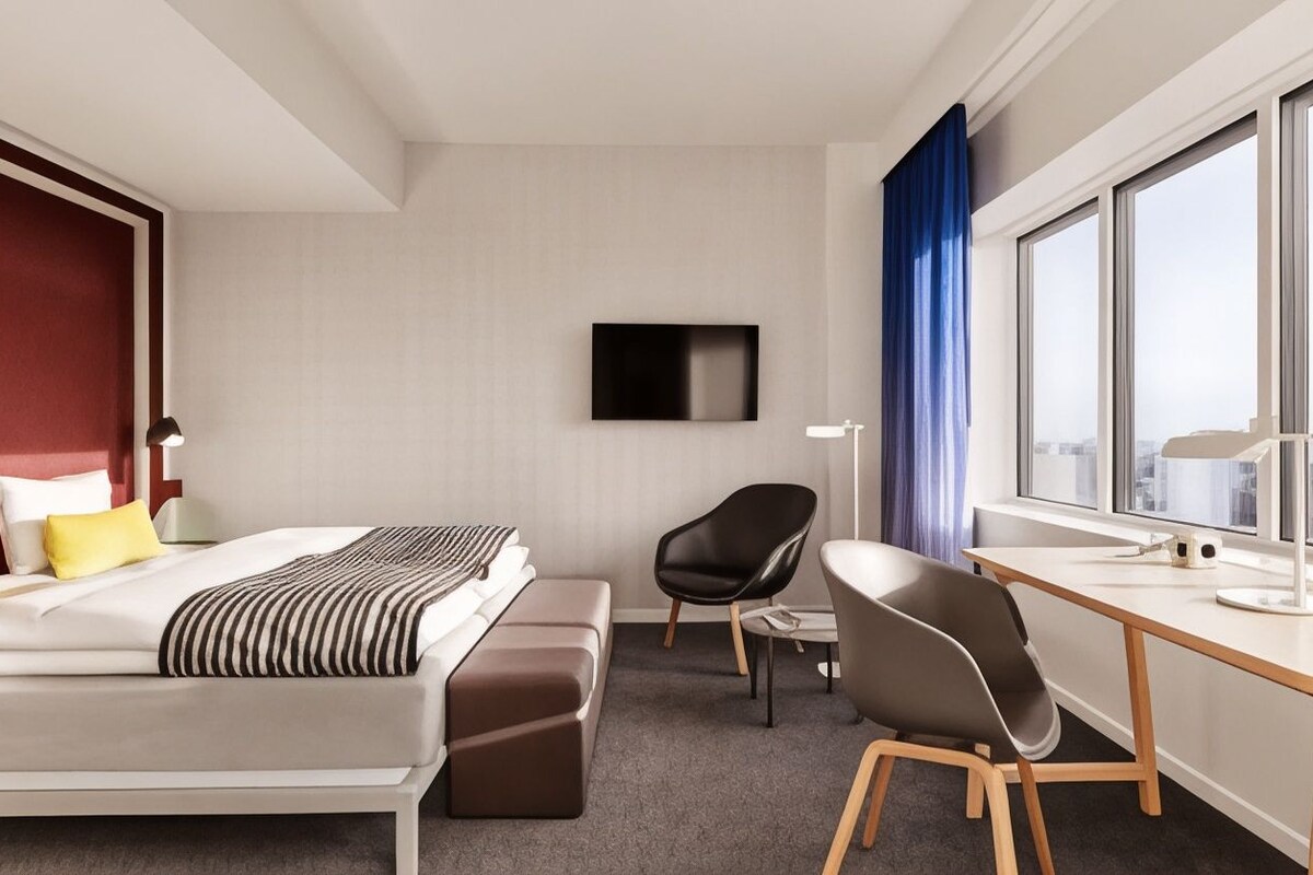 Luxe beddengoed, een kluis op de kamer, een bureau