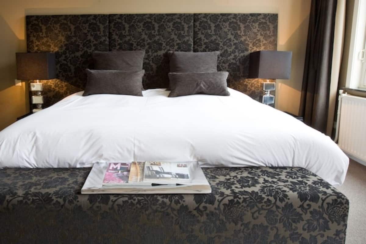 Premium bedding, down duvets, in-room safe, individually decorated