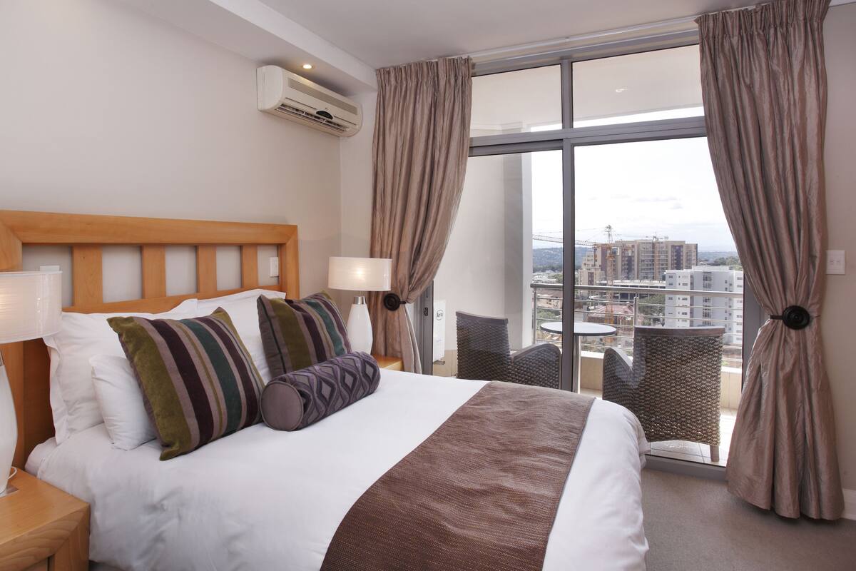 Two Bedroom Apartment: Hydro Park | 1 bedroom, in-room safe, blackout curtains, iron/ironing board