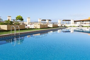 2 outdoor pools, pool umbrellas, pool loungers