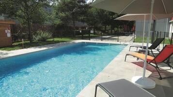 Seasonal outdoor pool, open 10:00 AM to 9:00 PM, sun loungers