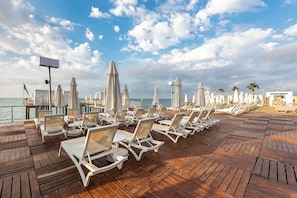 Private beach, sun loungers, beach umbrellas, beach towels