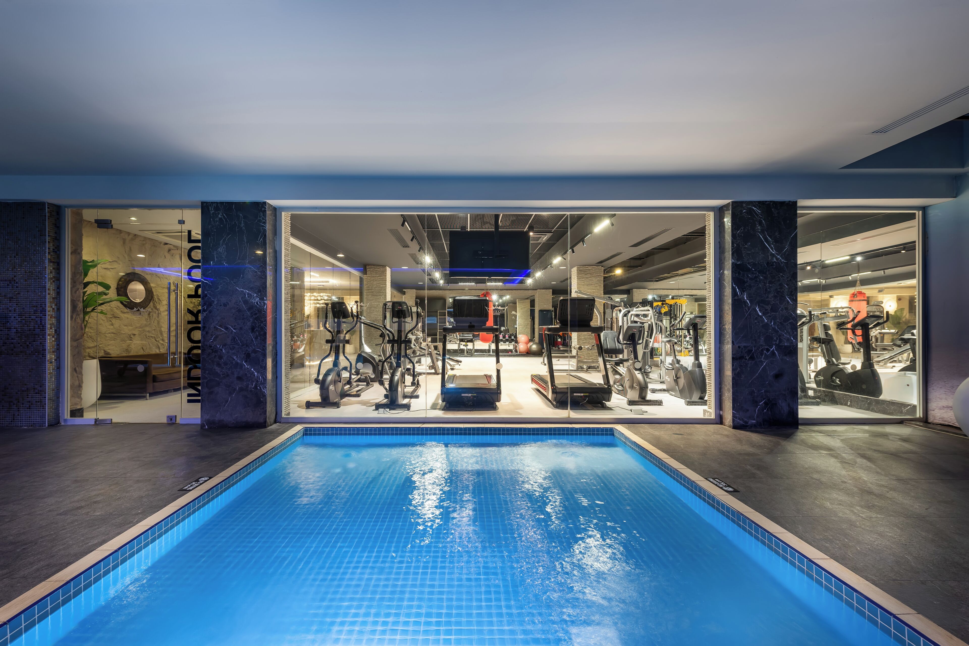 Indoor pool, seasonal outdoor pool, pool loungers