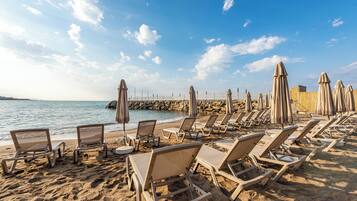 Private beach, sun loungers, beach umbrellas, beach towels